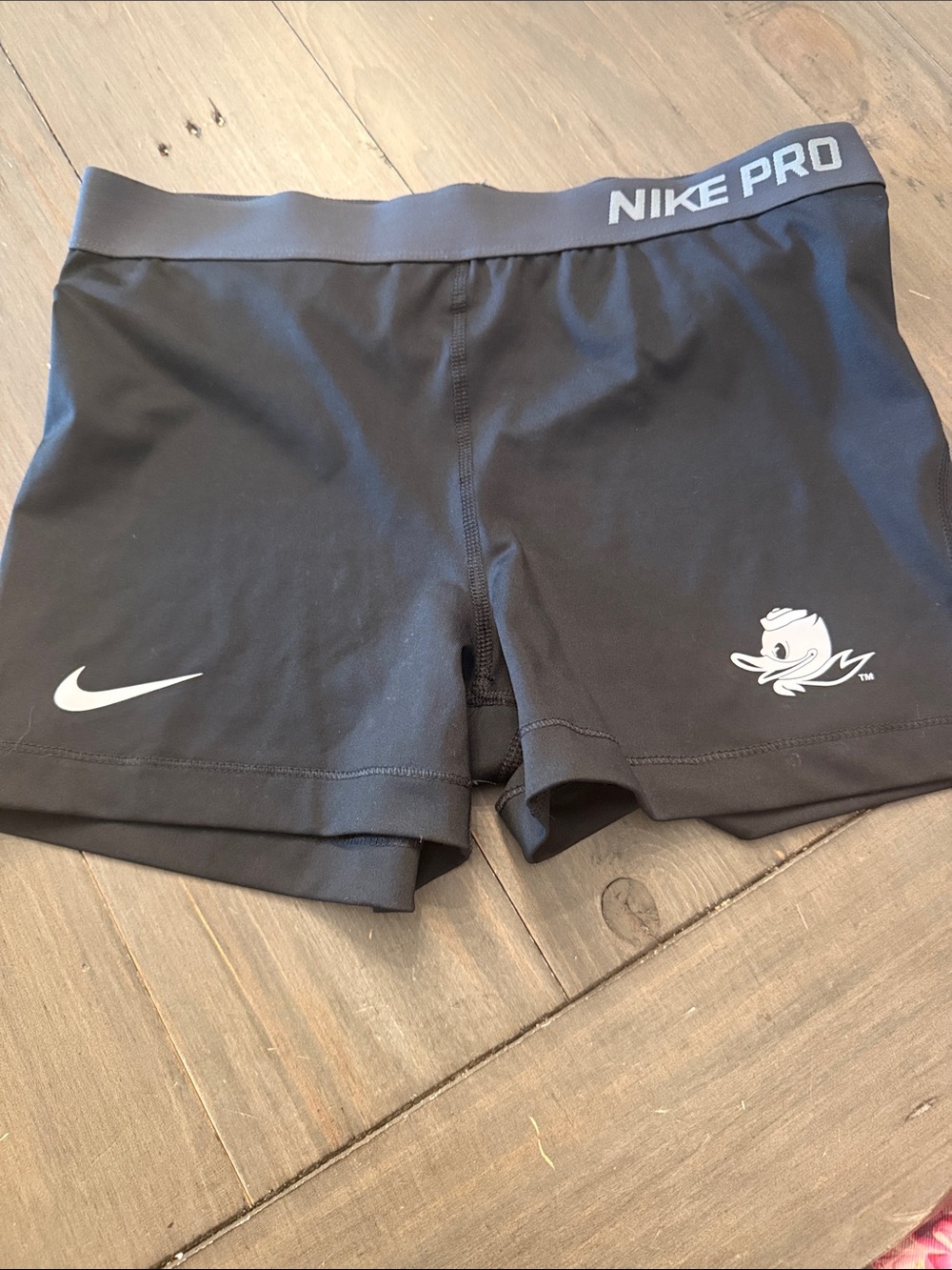 Nike Black womens Athletic Compression Shorts with White Logos
UofO Ducks!
Large